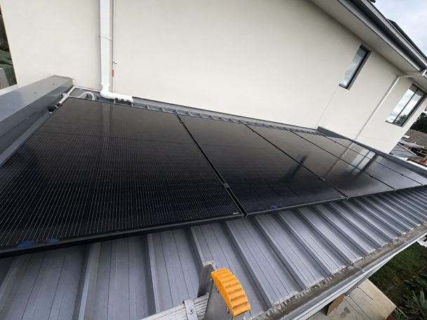 Jinko tiger neo iii panels on the tin roof pitch of daryl's balwyn north home