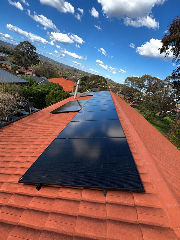 18 jinko solar tiger neo satin panels across the tile roof of cristiane's berwick home