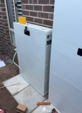 Hiconics inverter and battery on the levelled concrete pad at leigh's berwick home