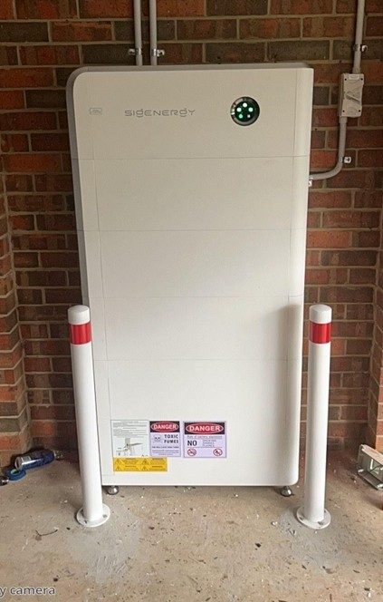 Completed sigenergy sigenstor battery installation on the brick wall of steven's bittern home