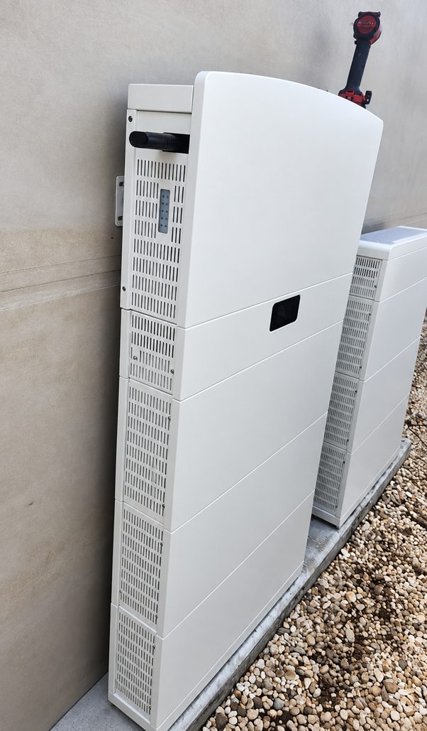 Close-up of the battery unit installed against the exterior wall of duncan's blairgowrie home