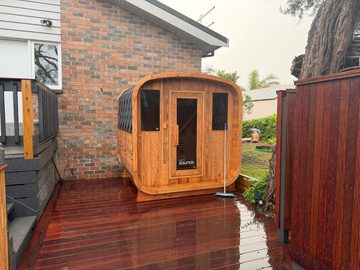 Outdoor cedar sauna on the back deck