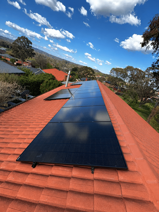 18 jinko solar panels on the tile roof of a home in berwick