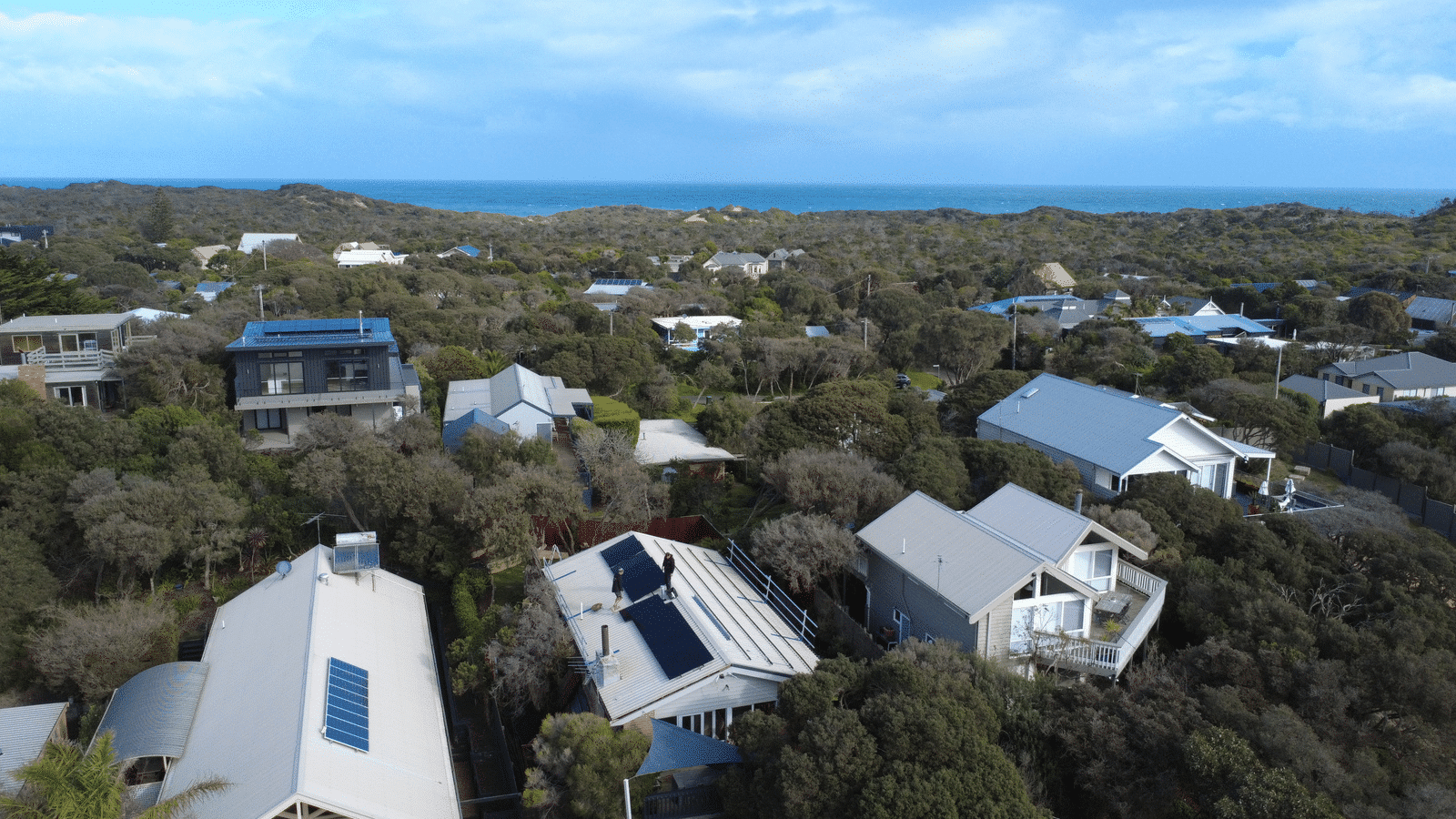 Aerial view over blairgowrie homes near the coast, including a double-storey home taken off gas by powerband electrical