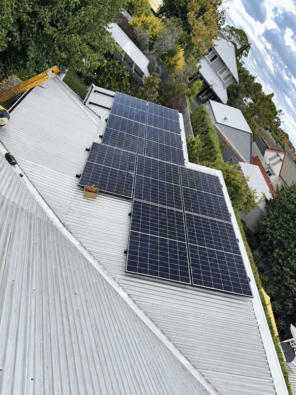 Jinko solar panels on the roof of a brighton home
