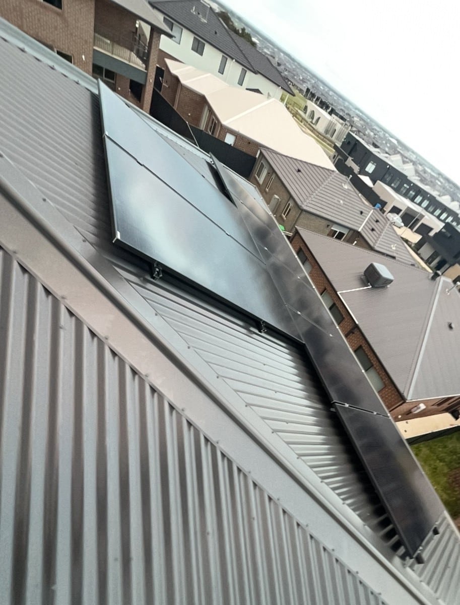 Jinko solar panels on the roof of a new home in clyde north, installed by powerband electrical