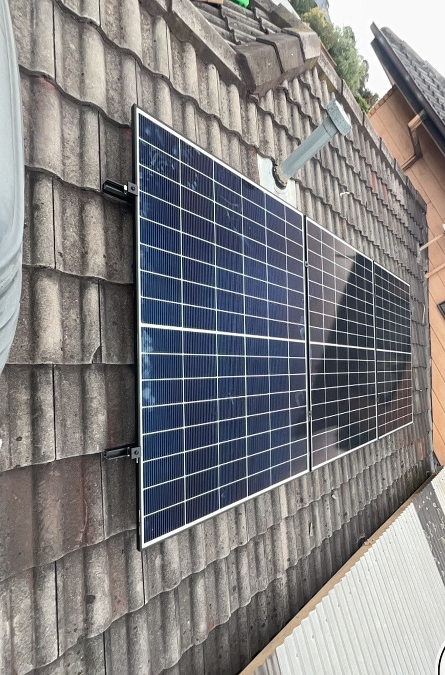 Finished run of jinko tiger neo solar panels on a tile roof in cranbourne