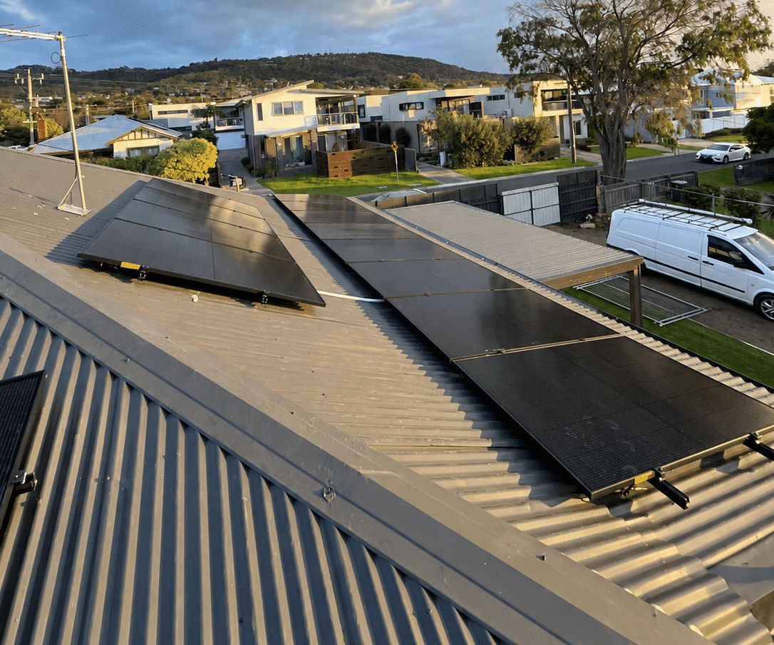 Jinko solar panels split across two roof faces of a new home in dromana