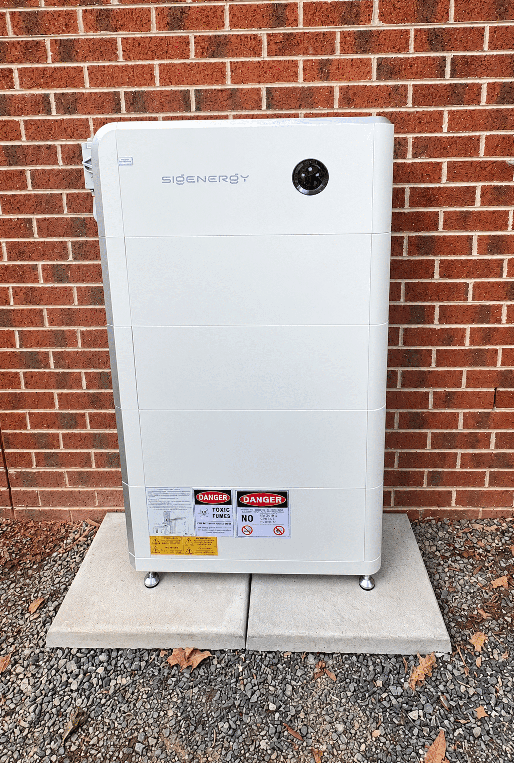 Sigenergy sigenstor battery modules mounted on the exterior brick wall of a ferntree gully home