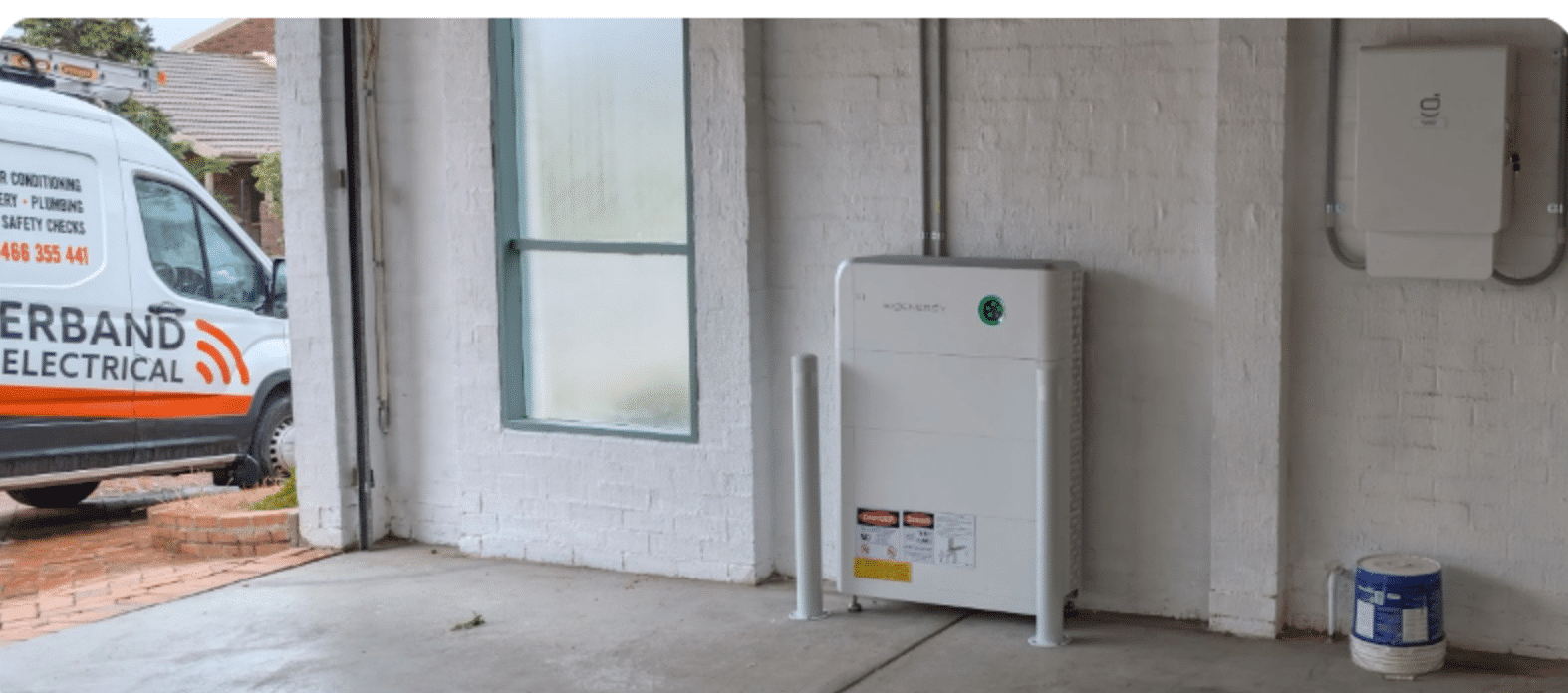 Sigenergy battery installed in a frankston garage with a powerband van outside
