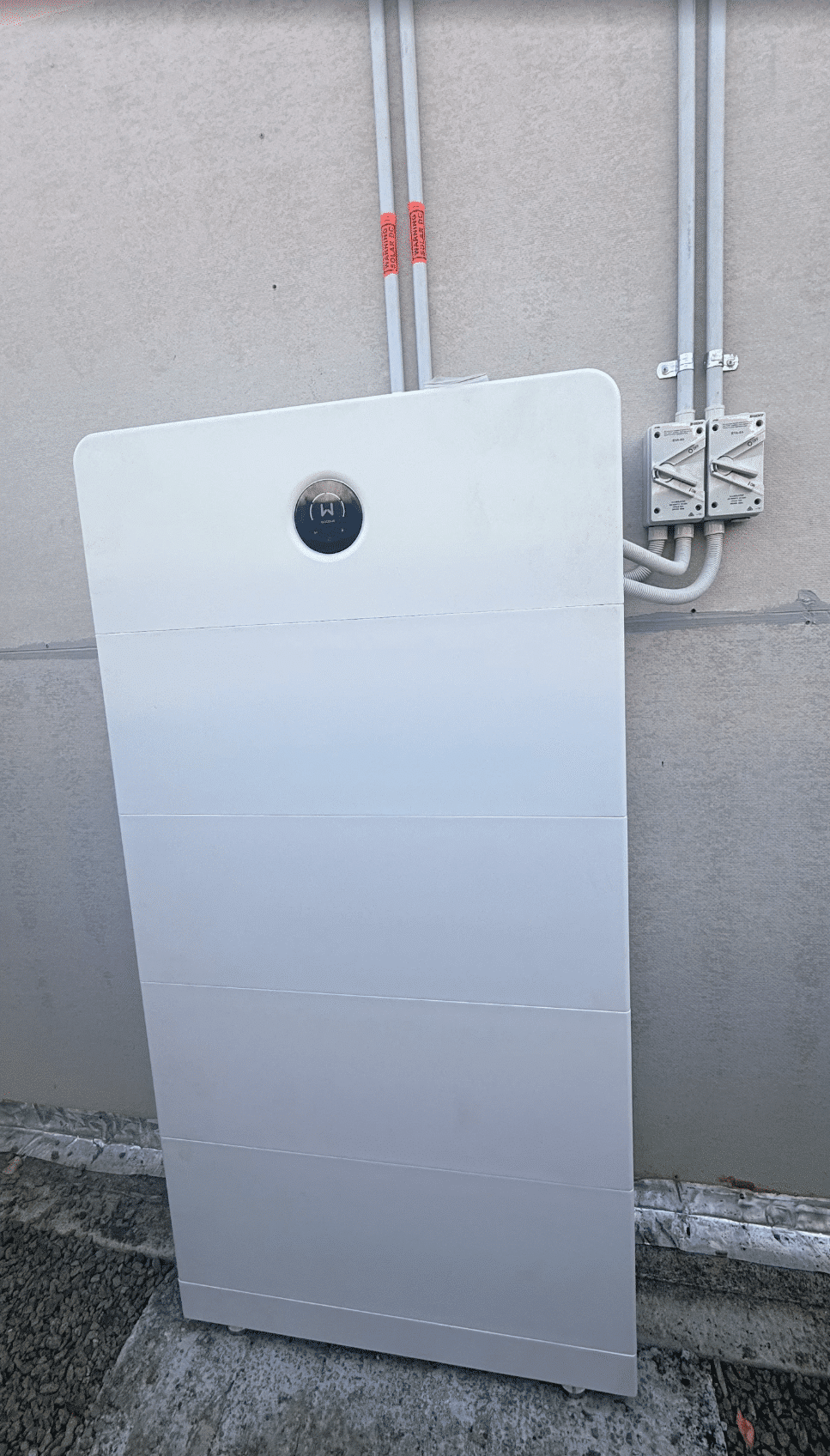 Goodwe battery on an exterior wall beside the switchboard at a hastings home