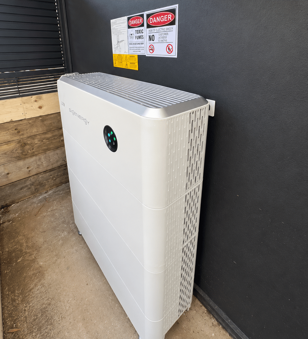 Sigenergy sigenstor battery mounted against a wall with bollard protection in rye