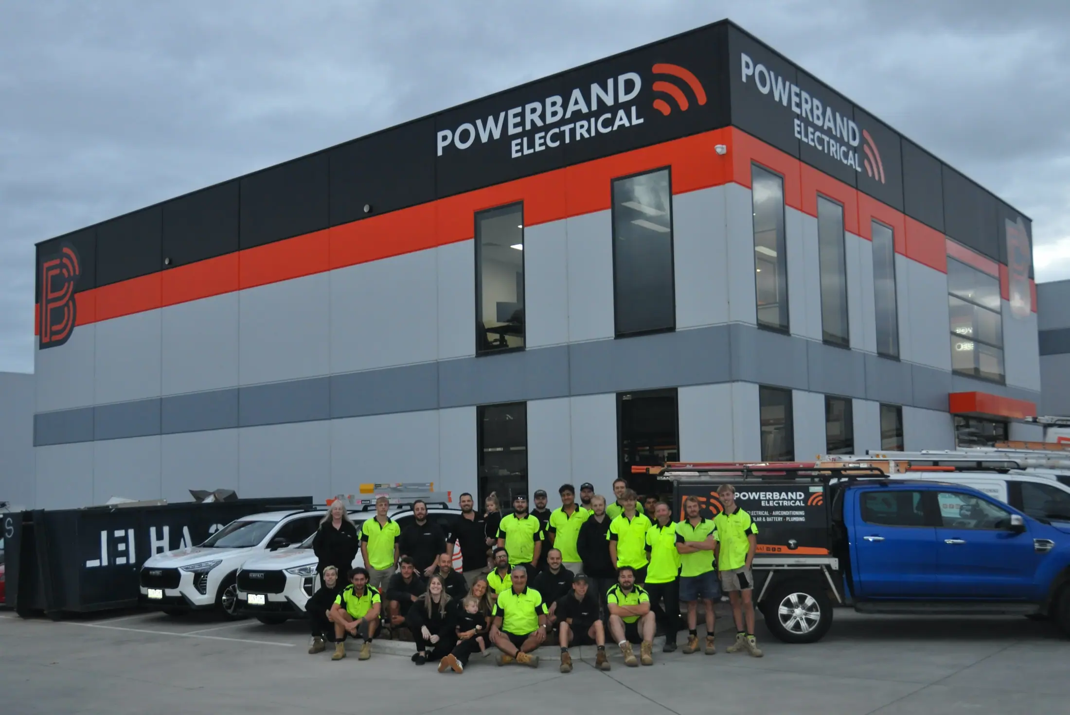 About Us 1 The powerband electrical team outside the somerville office