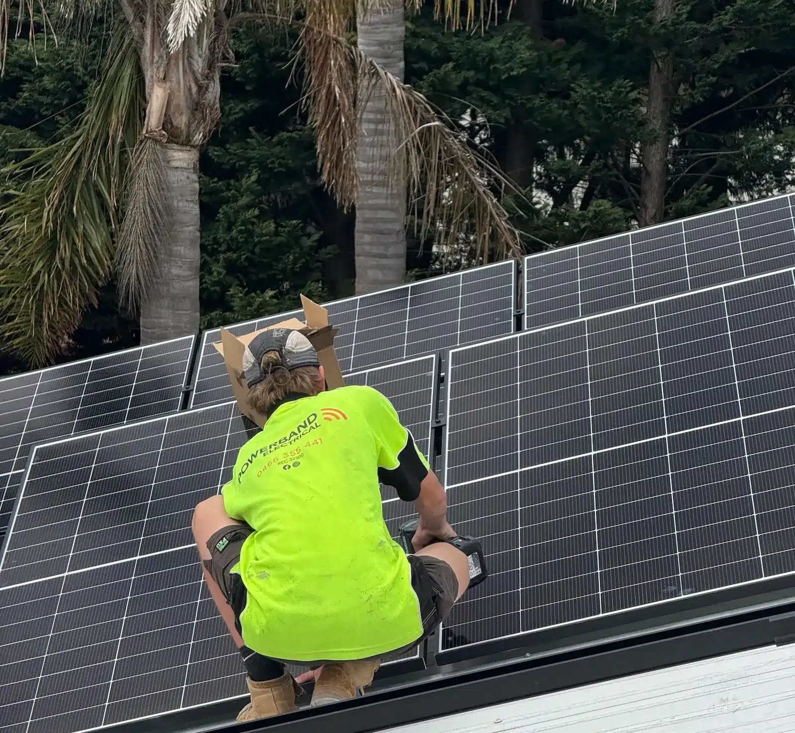 Powerband electrical installer commissioning a solar and battery system in a melbourne garage